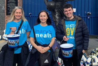 Community volunteers attending a fundraising event.